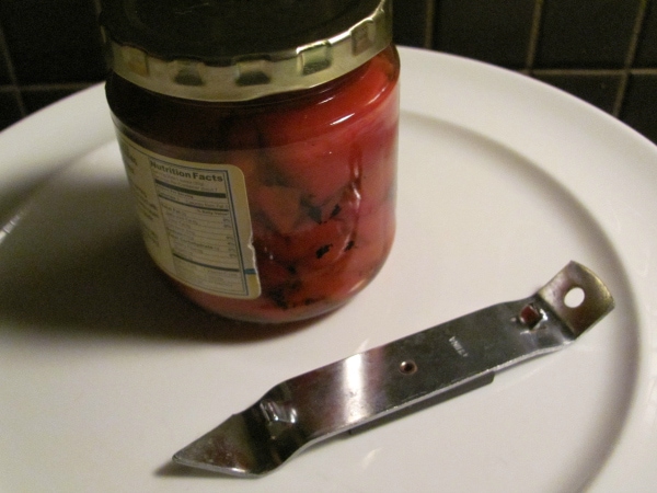 Use a bottle opener to open a stuck jar