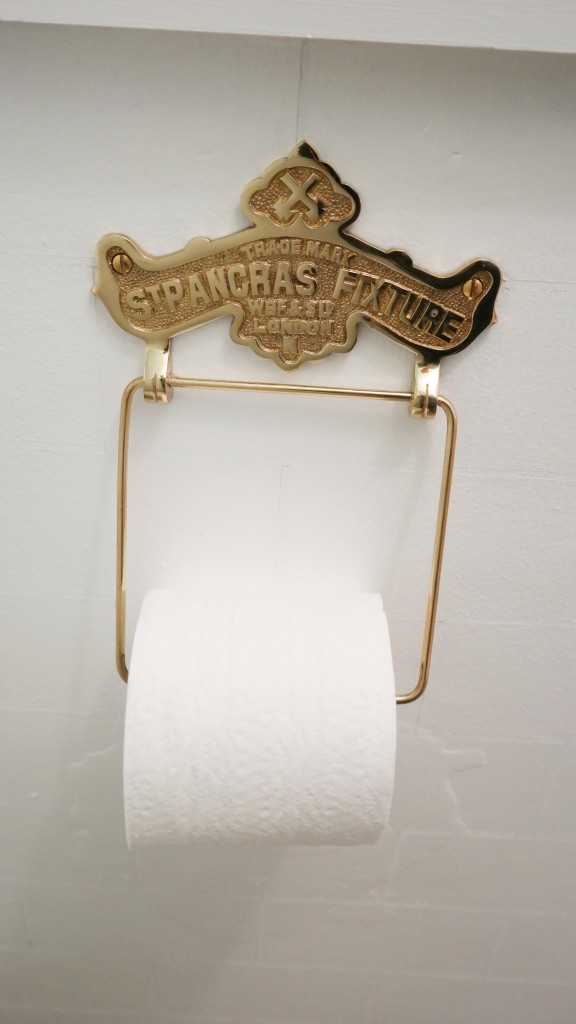 Antique reproduction brass toilet paper holder