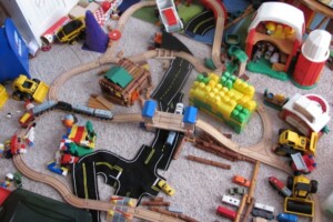 Toy city with Lego, Megabloks, Lincoln Logs, Brio