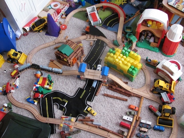 Toy city with Lego, Megabloks, Lincoln Logs, Brio