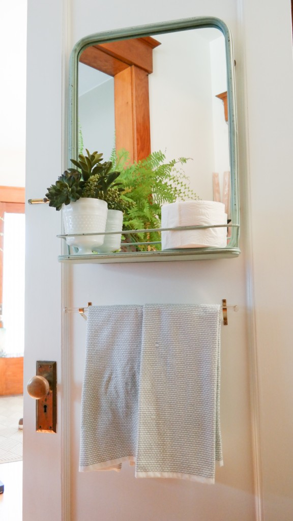 Bathroom vanity mirror with shelf